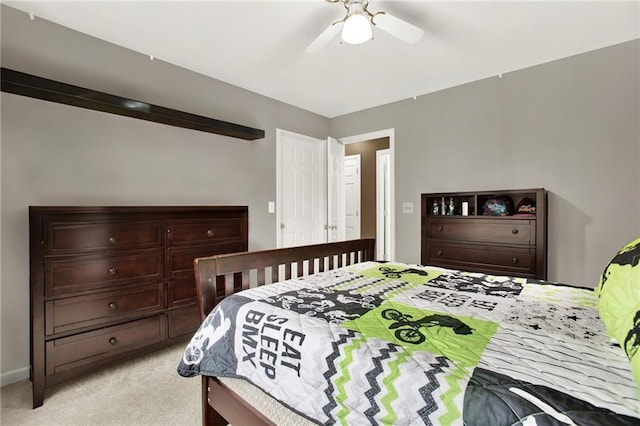 bedroom featuring light carpet and ceiling fan