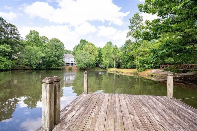 view of dock with a water view