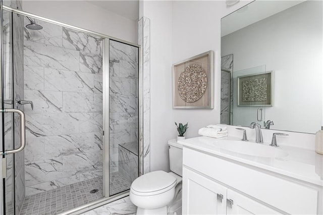 full bath with a marble finish shower, toilet, marble finish floor, and vanity