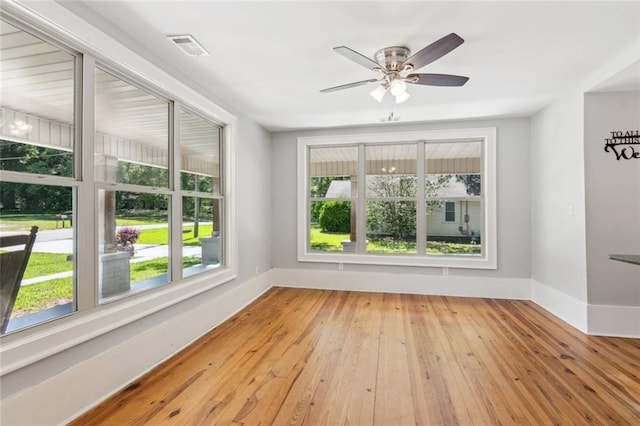 1382 6th Ave, Auburn, GA 30011 - empty room with a ceiling fan, wood-type flooring, and baseboards