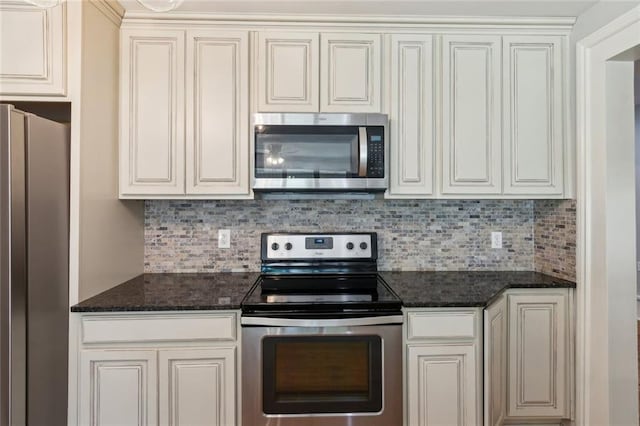 1382 6th Ave, Auburn, GA 30011 - kitchen with appliances with stainless steel finishes, tasteful backsplash, and dark stone countertops