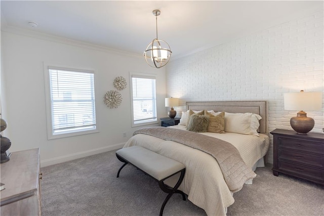 bedroom featuring light carpet, brick wall, ornamental molding, and a notable chandelier