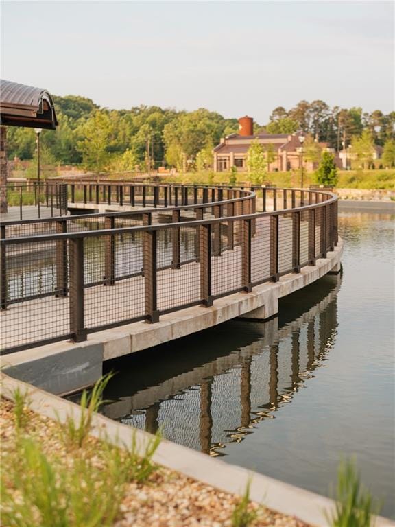 view of dock with a water view