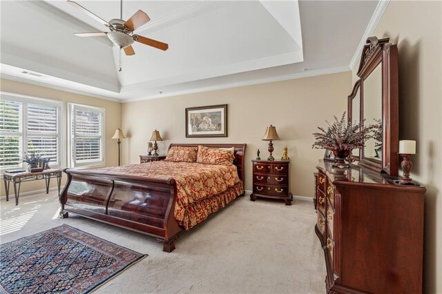 11715 Dancliff Trce, Alpharetta, GA 30009 - bedroom with a tray ceiling, light colored carpet, ceiling fan, baseboards, and crown molding