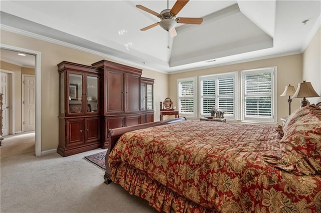 11715 Dancliff Trce, Alpharetta, GA 30009 - bedroom featuring crown molding, light colored carpet, a tray ceiling, and ceiling fan