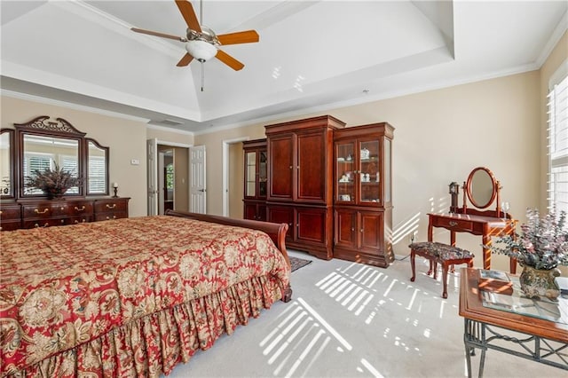 11715 Dancliff Trce, Alpharetta, GA 30009 - bedroom with a tray ceiling, light carpet, ornamental molding, and ceiling fan