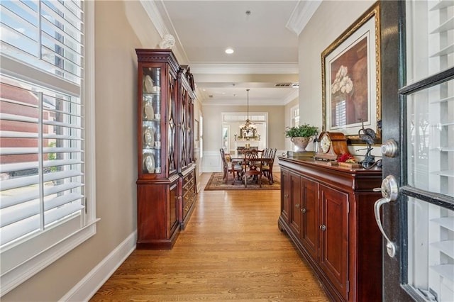 11715 Dancliff Trce, Alpharetta, GA 30009 - corridor featuring plenty of natural light, light wood-style flooring, and ornamental molding