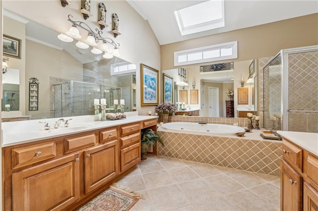 11715 Dancliff Trce, Alpharetta, GA 30009 - bathroom featuring a shower stall, a skylight, a bath, tile patterned floors, and vanity