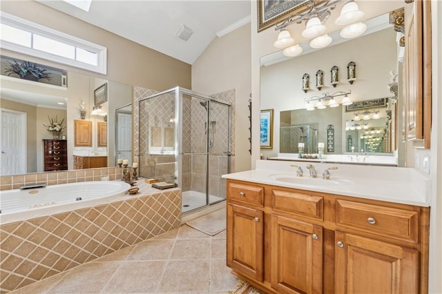 11715 Dancliff Trce, Alpharetta, GA 30009 - full bath with a stall shower, a garden tub, vanity, crown molding, and tile patterned flooring
