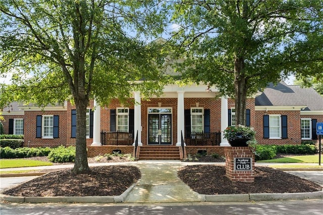 11715 Dancliff Trce, Alpharetta, GA 30009 - view of front of property with a porch and brick siding