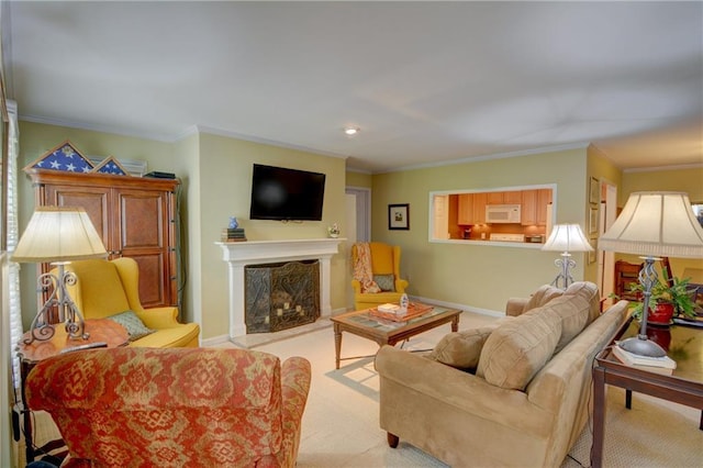 carpeted living area featuring a fireplace, baseboards, and ornamental molding