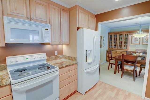 kitchen with light wood-style flooring, light brown cabinets, light stone counters, white appliances, and crown molding