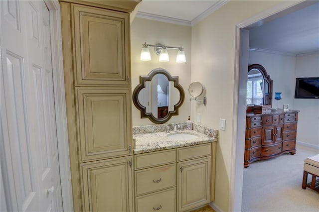 bathroom with vanity, baseboards, and ornamental molding