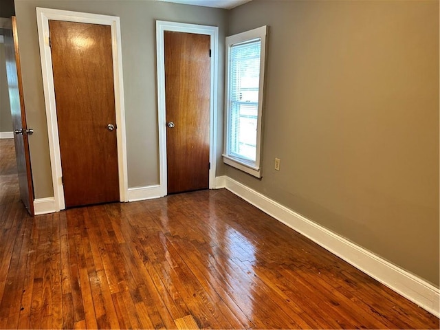 2203 Hillcrest Ave, Decatur, GA 30032 - unfurnished bedroom with dark hardwood / wood-style floors