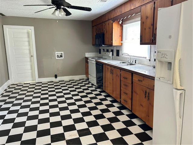 2203 Hillcrest Ave, Decatur, GA 30032 - kitchen featuring ceiling fan, a textured ceiling, black appliances, and sink