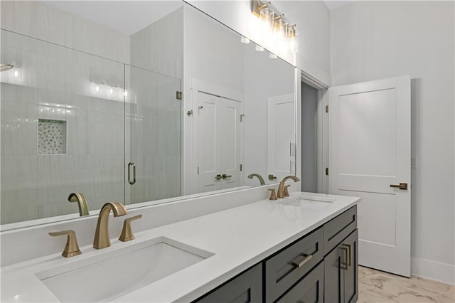 bathroom with vanity and an enclosed shower