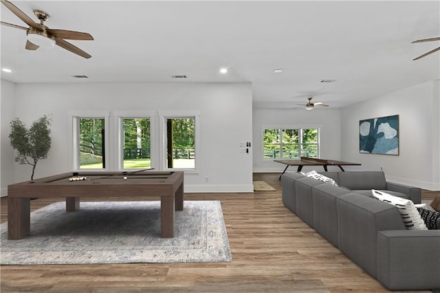 recreation room with pool table, hardwood / wood-style flooring, and ceiling fan