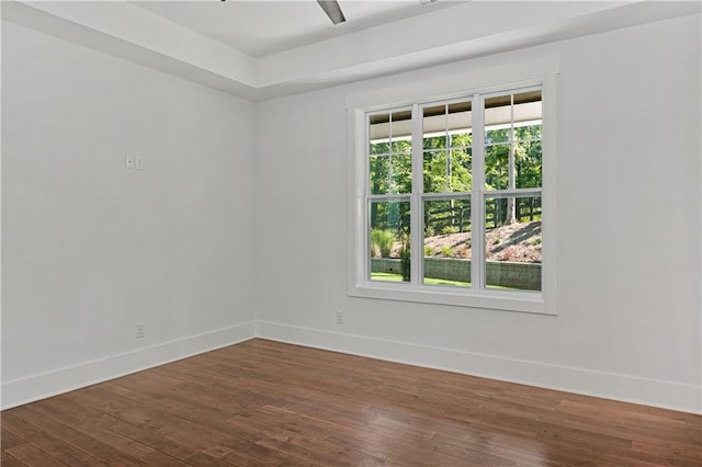 unfurnished room with hardwood / wood-style floors