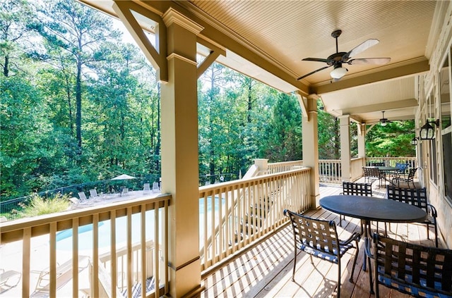 wooden deck with ceiling fan