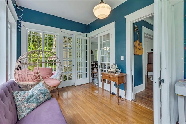 222 Winnona Dr, Decatur, GA 30030 - living area with french doors and wood finished floors