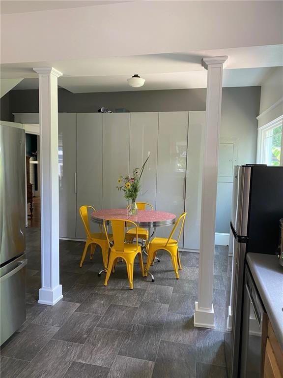 222 Winnona Dr, Decatur, GA 30030 - dining area featuring decorative columns and baseboards