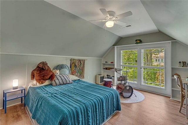 222 Winnona Dr, Decatur, GA 30030 - bedroom featuring wood finished floors, lofted ceiling, and ceiling fan