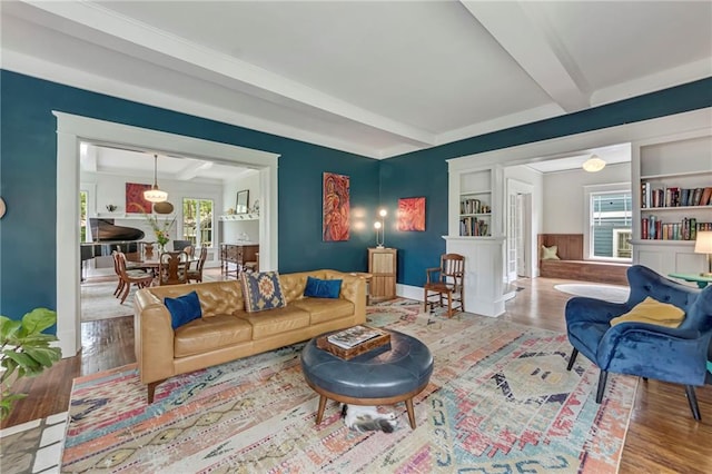 222 Winnona Dr, Decatur, GA 30030 - living area with wood finished floors and beam ceiling