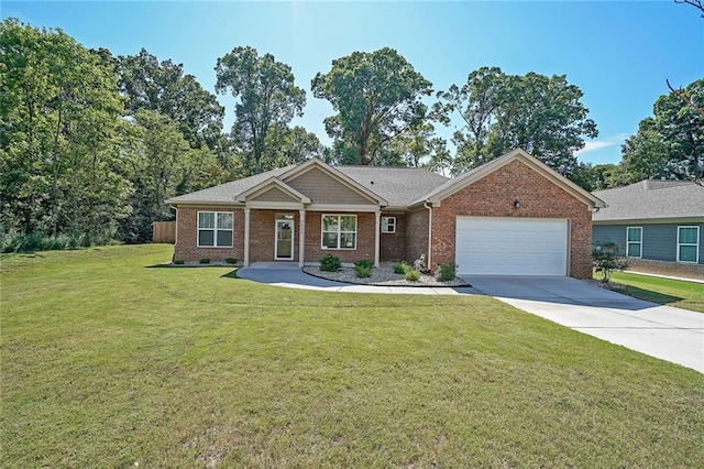 686 Stark St, Lawrenceville, GA 30046 - ranch-style house featuring an attached garage, brick siding, concrete driveway, and a front lawn