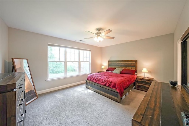 686 Stark St, Lawrenceville, GA 30046 - carpeted bedroom with baseboards and a ceiling fan