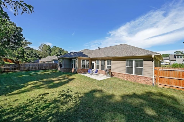 686 Stark St, Lawrenceville, GA 30046 - rear view of property with brick siding, a fenced backyard, and a patio area