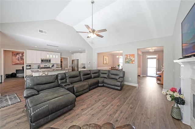 686 Stark St, Lawrenceville, GA 30046 - living room featuring ceiling fan, wood finished floors, high vaulted ceiling, and baseboards