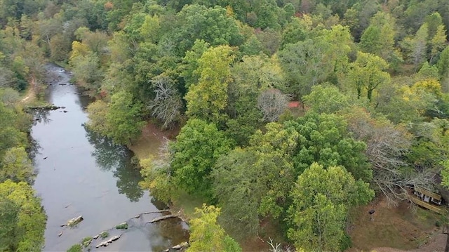 aerial view featuring a water view and a view of trees