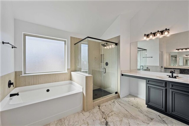 bathroom featuring vanity, separate shower and tub, and lofted ceiling