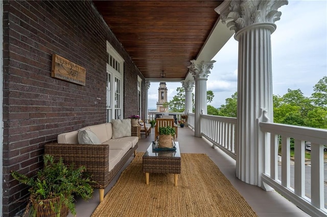 balcony with an outdoor hangout area