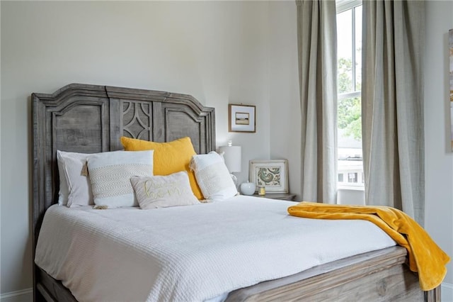 bedroom featuring multiple windows