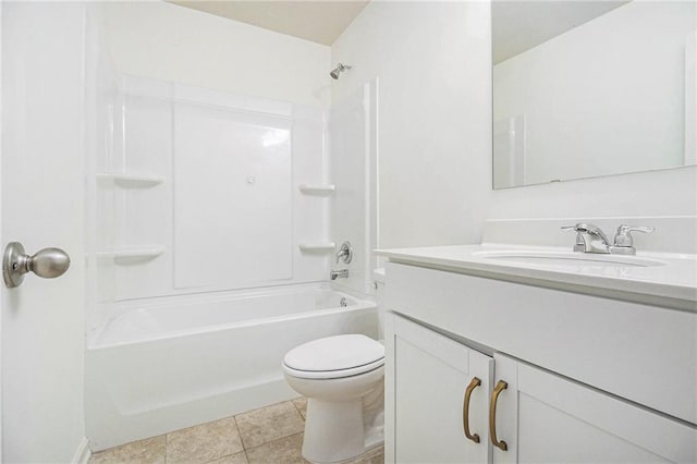bathroom featuring vanity, tile patterned floors, toilet, and shower / washtub combination