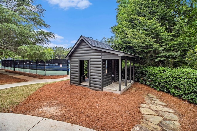 view of outdoor structure with an outdoor structure and fence