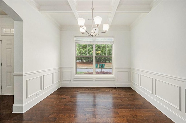 unfurnished dining area featuring an inviting chandelier, arched walkways, coffered ceiling, and dark wood-type flooring