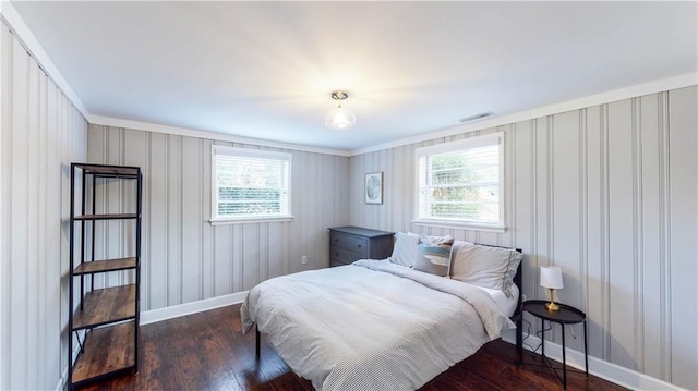 bedroom featuring dark wood-type flooring