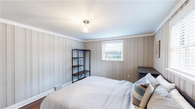 bedroom featuring dark hardwood / wood-style flooring