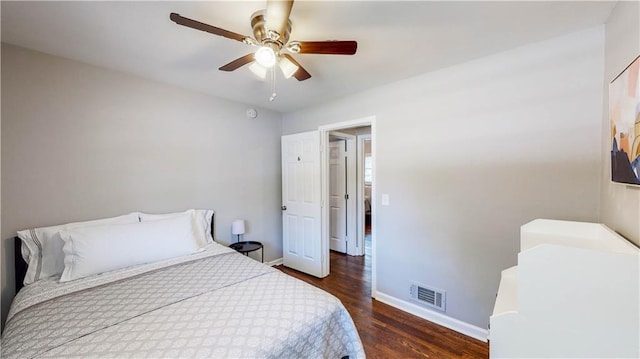 bedroom featuring dark wood-type flooring and ceiling fan