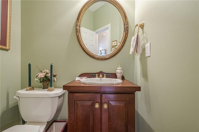 half bath with toilet and vanity