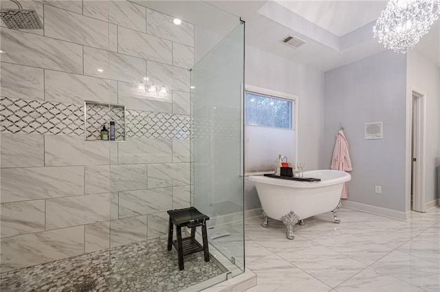 full bath featuring visible vents, baseboards, walk in shower, a freestanding bath, and marble finish floor