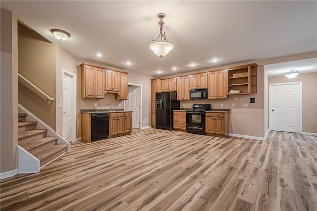 kitchen featuring black appliances, light wood-style flooring, recessed lighting, and open shelves