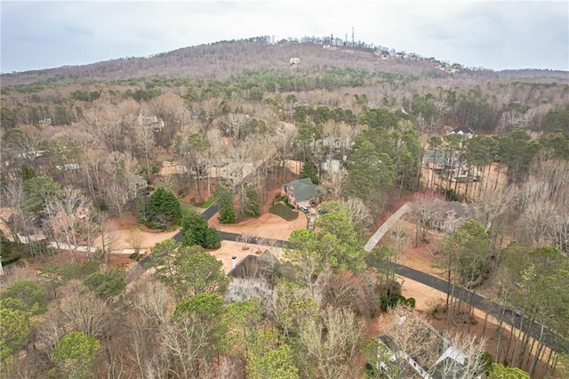 bird's eye view featuring a view of trees