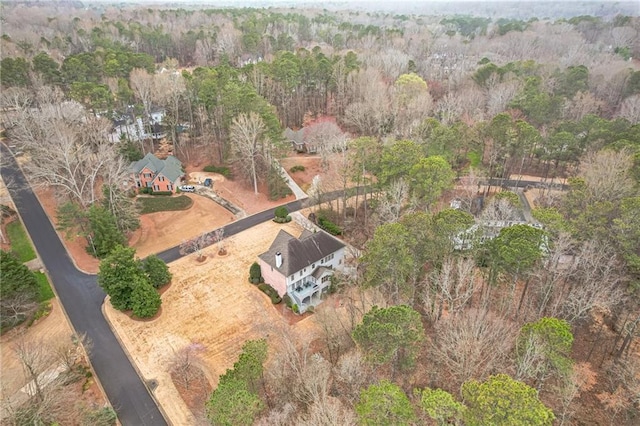 bird's eye view featuring a view of trees