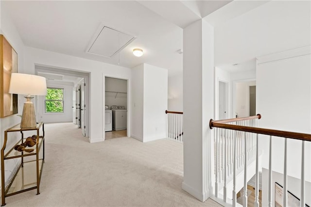325 Cranbrooke Cir, Suwanee, GA 30024 - corridor with attic access, independent washer and dryer, light carpet, and an upstairs landing