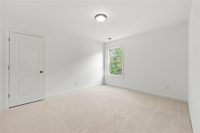 325 Cranbrooke Cir, Suwanee, GA 30024 - spare room featuring baseboards and carpet