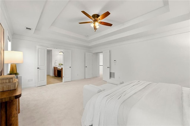 325 Cranbrooke Cir, Suwanee, GA 30024 - bedroom featuring a tray ceiling, light carpet, ensuite bathroom, and a ceiling fan