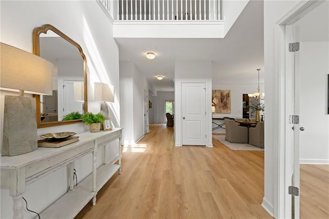 325 Cranbrooke Cir, Suwanee, GA 30024 - entrance foyer featuring light wood-type flooring and a chandelier